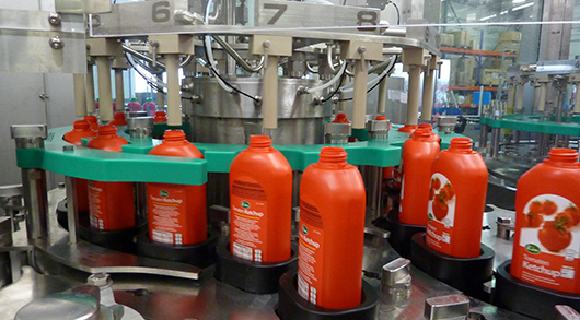 Dry decontamination of the packaging just before weight filling